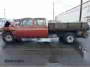 1983 Chevrolet Silverado 3500 z VIN 1GCGC33J4DS147895, wystawiony jako IAAI lot #40929512 z przebiegiem 13 095 mil mil oraz . Historia ofert i sprzedaży dostępna na DreamBid. Obrazek 14.