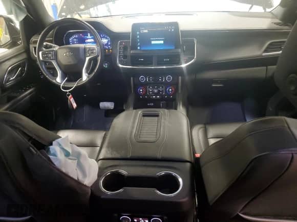 2023 Chevrolet Suburban Z71 с VIN 1GNSKDKD1PR165398, выставлен на аукционе Copart как лот 51866935 с пробегом 14 924 миль миль и Списание • Salvage title. История ставок и продаж доступна на DreamBid. Изображение 8.