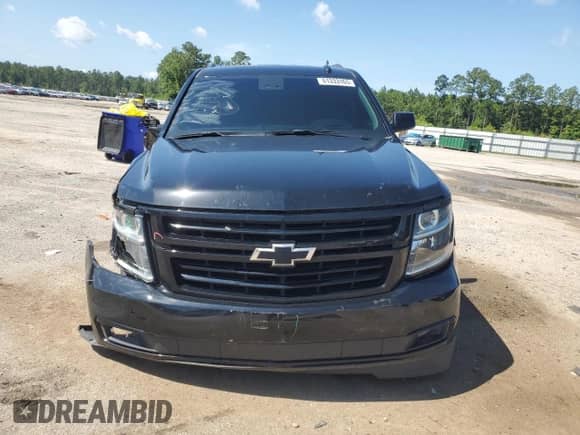 2019 Chevrolet Tahoe Premier with VIN 1GNSCCKJ3KR322922, listed as a Copart auction lot 61333165 with 106,380 mi miles and Salvage title. Bid and sale history available at DreamBid. Image 5.