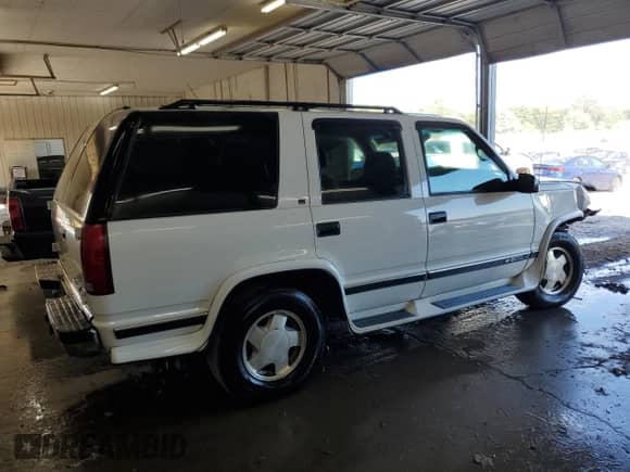 1997 Chevrolet Tahoe с VIN 1GNEK13RXVJ361826, выставлен на аукционе Copart как лот 69090955 с пробегом 205 640 миль миль и Списание • Salvage title. История ставок и продаж доступна на DreamBid. Изображение 3.