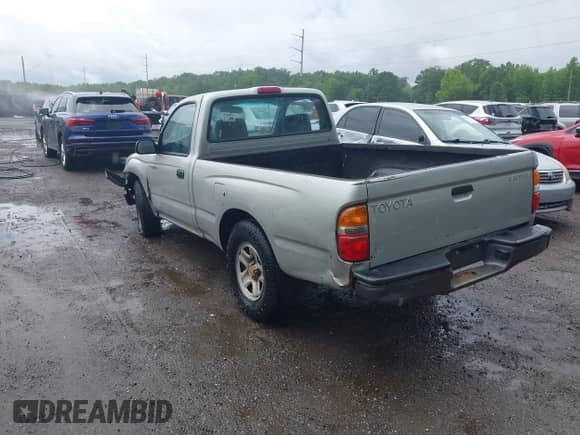 2001 Toyota Tacoma z VIN 5TENL42N41Z795150, wystawiony jako IAAI lot #42657291 z przebiegiem 288 053 mil mil oraz . Historia ofert i sprzedaży dostępna na DreamBid. Obrazek 3.