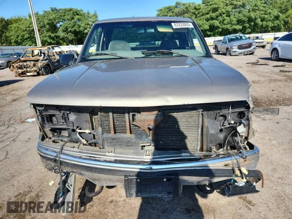 1999 Chevrolet Silverado 2500 with VIN 1GCGK29R4XF051160, listed as a Copart auction lot 67233005 with 226,759 mi miles and Salvage title. Bid and sale history available at DreamBid. Image 5.