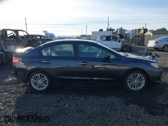 2012 Subaru Impreza Limited z VIN JF1GJAH68CH007445, wystawiony jako IAAI lot #41356875 z przebiegiem 89 521 mil mil oraz . Historia ofert i sprzedaży dostępna na DreamBid. Obrazek 14.