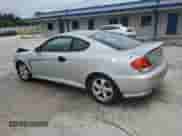 2006 Hyundai Tiburon GS с VIN KMHHM65D16U219309, выставлен на аукционе Copart как лот 86110765 с пробегом 166 452 миль миль и Чистый • Clean title. История ставок и продаж доступна на DreamBid. Изображение 2.