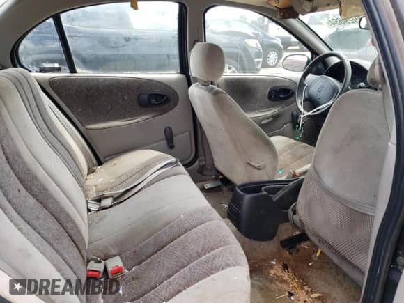 1997 Saturn SW with VIN 1G8ZK8279VZ361444, listed as a Copart auction lot 58929684 with 128,554 mi miles and Clean title. Bid and sale history available at DreamBid. Image 10.