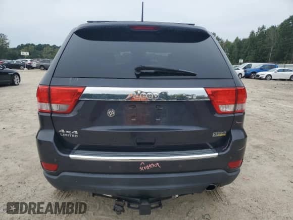 2012 Jeep Grand Cherokee Limited z VIN 1C4RJFBG8CC300891, wystawiony jako Copart lot #84041155 z przebiegiem 141 239 mil mil oraz Czysty tytuł • Clean title. Historia ofert i sprzedaży dostępna na DreamBid. Obrazek 6.