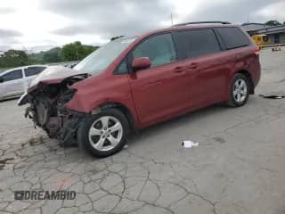2014 Toyota Sienna LE AAS with VIN 5TDKK3DC1ES448857, listed as a Copart auction lot 61847415 with 186,586 mi miles and Salvage title. Bid and sale history available at DreamBid. Image 1.