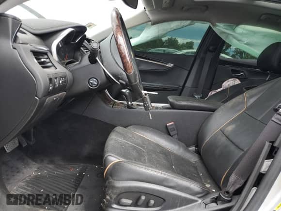 2014 Chevrolet Impala LTZ z VIN 1G1155S39EU109625, wystawiony jako Copart lot #69701305 z przebiegiem Nie podano mil oraz Szkoda całkowita • Salvage title. Historia ofert i sprzedaży dostępna na DreamBid. Obrazek 7.