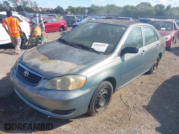 2005 Toyota Corolla CE with VIN 1NXBR32EX5Z565599, listed as a IAAI auction lot 43343091 with Not provided miles and . Bid and sale history available at DreamBid. Image 2.