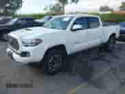 2020 Toyota Tacoma SR5 z VIN 3TMBZ5DN7LM026596, wystawiony jako IAAI lot #40705410 z przebiegiem 123 489 mil mil oraz . Historia ofert i sprzedaży dostępna na DreamBid. Obrazek 2.