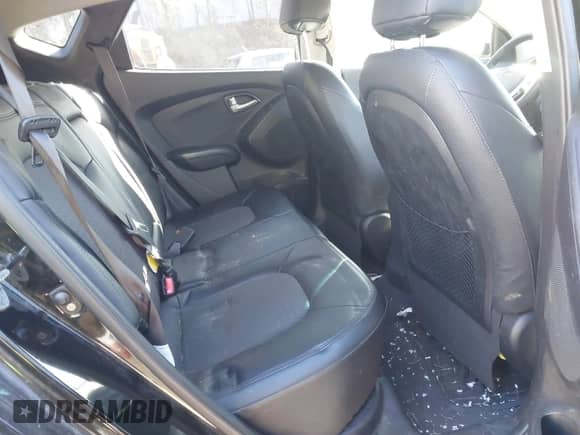 2013 Hyundai Tucson GLS z VIN KM8JUCAC4DU670518, wystawiony jako IAAI lot #43548057 z przebiegiem 115 233 mil mil oraz . Historia ofert i sprzedaży dostępna na DreamBid. Obrazek 8.