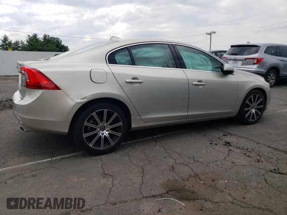 2018 Volvo S60 Inscription Platinum с VIN LYV402TM4JB165792, выставлен на аукционе Copart как лот 63076324 с пробегом 20 033 миль миль и Списание • Salvage title. История ставок и продаж доступна на DreamBid. Изображение 3.