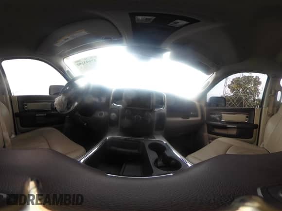 2018 Ram 1500 Laramie with VIN 1C6RR7NT1JS159292, listed as a IAAI auction lot 42893290 with 104,339 mi miles and . Bid and sale history available at DreamBid. Image 19.