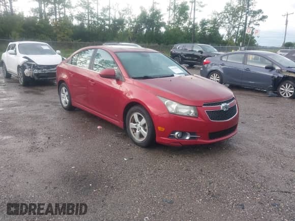2014 Chevrolet Cruze 1LT with VIN 1G1PD5SBXE7386450, listed as a IAAI auction lot 42916000 with 117,916 mi miles and . Bid and sale history available at DreamBid. Image 1.