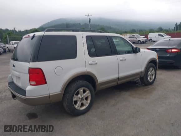 2003 Ford Explorer Eddie Bauer z VIN 1FMZU74KX3UC60074, wystawiony jako IAAI lot #42579589 z przebiegiem 149 873 mil mil oraz . Historia ofert i sprzedaży dostępna na DreamBid. Obrazek 4.
