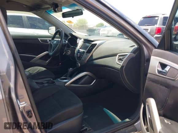 2015 Hyundai Veloster with VIN KMHTC6AD6FU239445, listed as a IAAI auction lot 42757675 with 114,509 mi miles and . Bid and sale history available at DreamBid. Image 5.