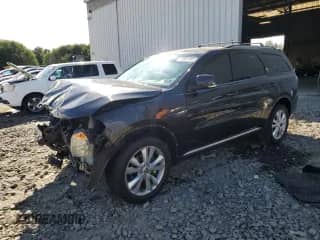 2012 Dodge Durango Crew with VIN 1C4RDJDG9CC337102, listed as a Copart auction lot 70657495 with 192,221 mi miles and Salvage title. Bid and sale history available at DreamBid. Image 1.