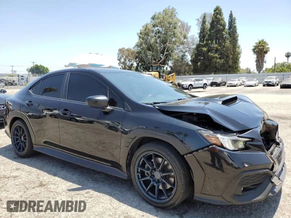 2022 Subaru WRX Premium with VIN JF1VBAH60N8006409, listed as a Copart auction lot 64672775 with 101,721 mi miles and Salvage title. Bid and sale history available at DreamBid. Image 4.