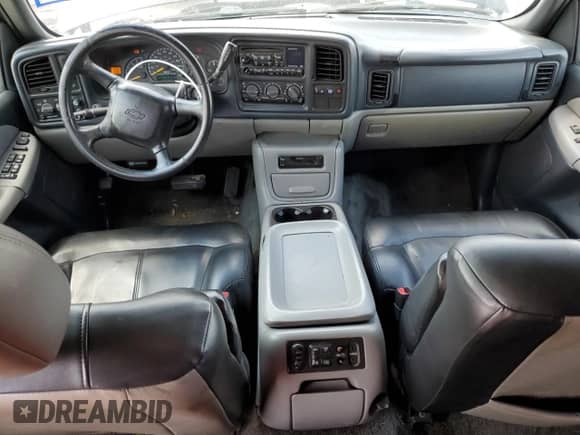 2001 Chevrolet Suburban LS z VIN 3GNEC16T81G168705, wystawiony jako Copart lot #71161814 z przebiegiem 183 828 mil mil oraz Szkoda całkowita • Salvage title. Historia ofert i sprzedaży dostępna na DreamBid. Obrazek 8.