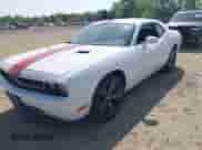 2013 Dodge Challenger SXT with VIN 2C3CDYAG3DH520016, listed as a IAAI auction lot 42117942 with 150,463 mi miles and . Bid and sale history available at DreamBid. Image 2.
