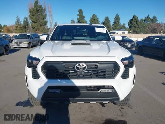 2024 Toyota Tacoma SR5 with VIN 3TMLB5JN8RM034034, listed as a IAAI auction lot 41253779 with 21,448 mi miles and . Bid and sale history available at DreamBid. Image 12.