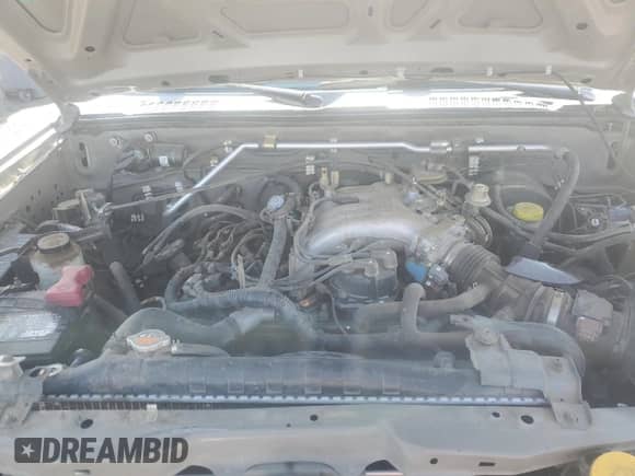 2004 Nissan Frontier XE Desert Runner с VIN 1N6ED26Y74C478131, выставлен на аукционе Copart как лот 67526105 с пробегом 163 926 миль миль и Списание • Salvage title. История ставок и продаж доступна на DreamBid. Изображение 11.