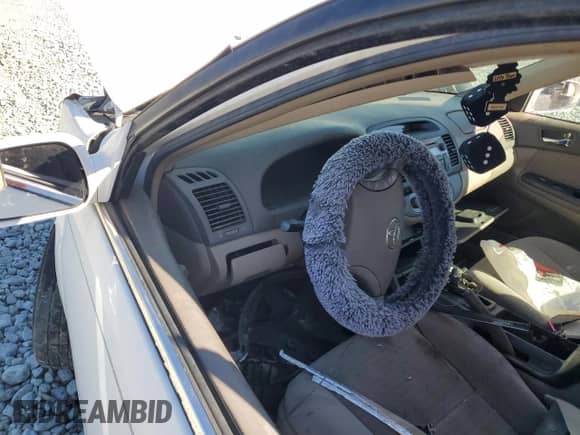 2006 Toyota Camry LE с VIN 4T1BE32K36U703728, выставлен на аукционе Copart как лот 81809785 с пробегом Не указан миль и Списание • Salvage title. История ставок и продаж доступна на DreamBid. Изображение 9.