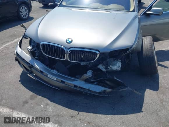 2006 BMW 7 Series 750i with VIN WBAHL83576DT05171, listed as a IAAI auction lot 42923233 with 66,131 mi miles and . Bid and sale history available at DreamBid. Image 6.