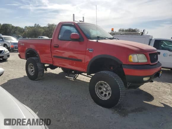 2003 Ford F-150 XL z VIN 1FTRF18W53NA99930, wystawiony jako Copart lot #49046965 z przebiegiem 139 433 mil mil oraz Szkoda całkowita • Salvage title. Historia ofert i sprzedaży dostępna na DreamBid. Obrazek 4.