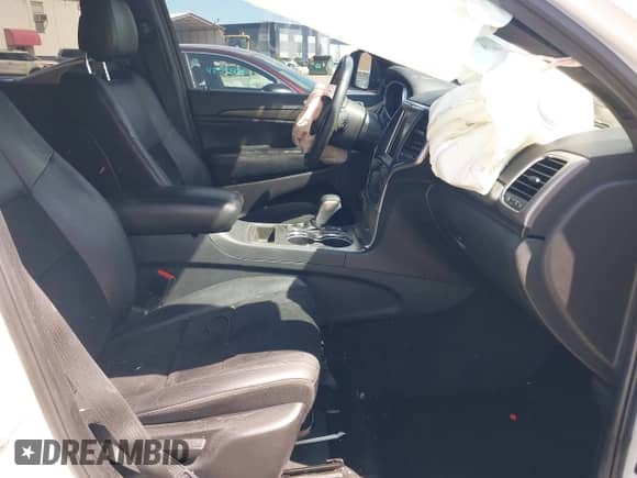 2018 Jeep Grand Cherokee Altitude with VIN 1C4RJEAG0JC197183, listed as a IAAI auction lot 42590501 with 140,990 mi miles and . Bid and sale history available at DreamBid. Image 5.