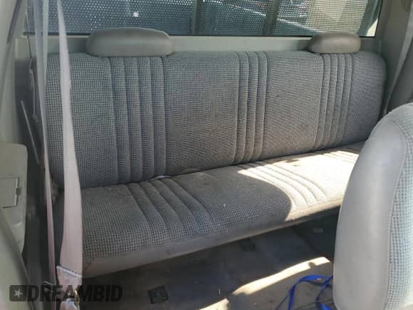 1997 GMC Sierra 1500 z VIN 1GTEC19R1VE528502, wystawiony jako Copart lot #65173775 z przebiegiem 153 295 mil mil oraz Szkoda całkowita • Salvage title. Historia ofert i sprzedaży dostępna na DreamBid. Obrazek 10.
