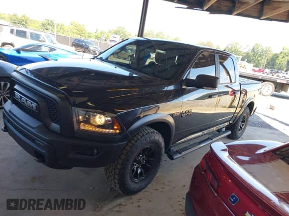 2018 Ram 1500 Rebel with VIN 1C6RR7YT4JS204186, listed as a IAAI auction lot 42668658 with 96,025 mi miles and . Bid and sale history available at DreamBid. Image 2.