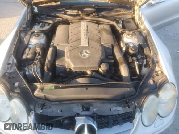 2003 Mercedes-Benz SL 500 z VIN WDBSK75F43F016291, wystawiony jako Copart lot #90453525 z przebiegiem 116 061 mil mil oraz Czysty tytuł • Clean title. Historia ofert i sprzedaży dostępna na DreamBid. Obrazek 11.