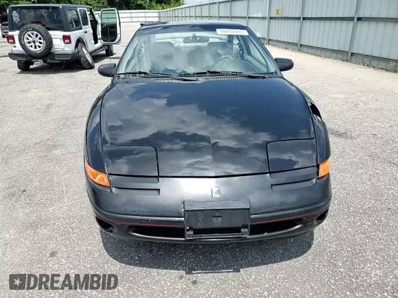1996 Saturn 2dr Coupe with VIN 1G8ZH1279TZ371071, listed as a Copart auction lot 66602245 with 107,563 mi miles and Salvage title. Bid and sale history available at DreamBid. Image 13.