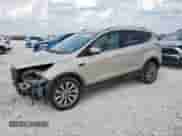 2017 Ford Escape Titanium с VIN 1FMCU0JD7HUB60105, выставлен на аукционе Copart как лот 81084435 с пробегом 104 682 миль миль и Списание • Salvage title. История ставок и продаж доступна на DreamBid. Изображение 1.