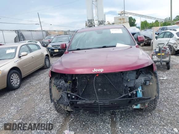 2017 Jeep Grand Cherokee Altitude with VIN 1C4RJFAGXHC688571, listed as a IAAI auction lot 42689557 with 145,121 mi miles and . Bid and sale history available at DreamBid. Image 12.