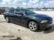 2014 Dodge Charger SE with VIN 2C3CDXBG4EH154769, listed as a Copart auction lot 51406345 with 253,019 mi miles and Clean title. Bid and sale history available at DreamBid. Image 4.