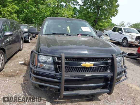 2014 Chevrolet Tahoe Commercial with VIN 1GNLC2E05ER164489, listed as a IAAI auction lot 42126712 with 192,159 mi miles and . Bid and sale history available at DreamBid. Image 12.