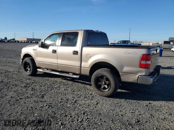 2006 Ford F-150 XLT with VIN 1FTPW145X6KD74881, listed as a Copart auction lot 85202045 with 220,674 mi miles and Salvage title. Bid and sale history available at DreamBid. Image 2.