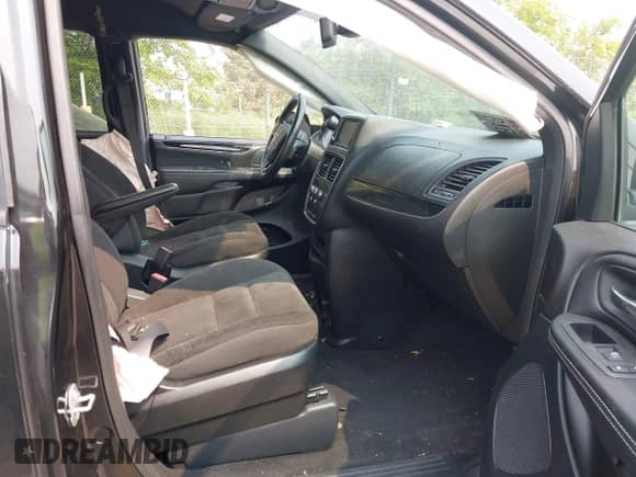 2019 Dodge Grand Caravan SE z VIN 2C4RDGBG6KR509257, wystawiony jako IAAI lot #42403074 z przebiegiem 90 250 mil mil oraz . Historia ofert i sprzedaży dostępna na DreamBid. Obrazek 5.