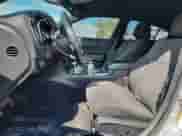 2016 Dodge Charger SXT with VIN 2C3CDXHGXGH317595, listed as a Copart auction lot 81738855 with 128,467 mi miles and Salvage title. Bid and sale history available at DreamBid. Image 7.