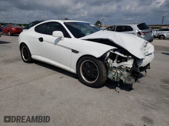 2007 Hyundai Tiburon GT с VIN KMHHN66F17U235198, выставлен на аукционе Copart как лот 70841514 с пробегом Не указан миль и Списание • Salvage title. История ставок и продаж доступна на DreamBid. Изображение 4.
