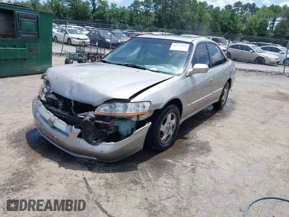 1998 Honda Accord EX with VIN 1HGCG6671WA055058, listed as a IAAI auction lot 42526616 with 274,878 mi miles and . Bid and sale history available at DreamBid. Image 2.