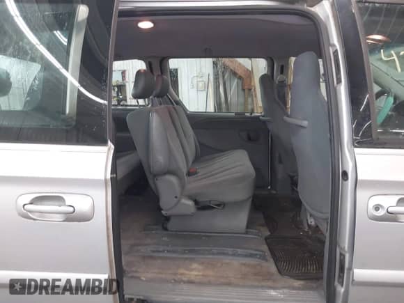 2005 Dodge Caravan SE with VIN 1D4GP25B85B346506, listed as a IAAI auction lot 42761350 with 137,830 mi miles and . Bid and sale history available at DreamBid. Image 8.
