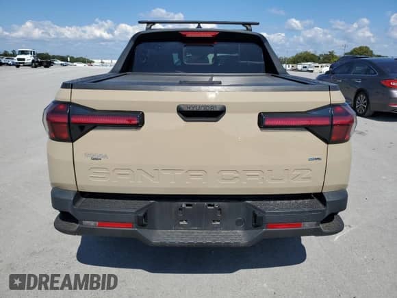 2023 Hyundai Santa Cruz SEL с VIN 5NTJCDAE3PH070748, выставлен на аукционе Copart как лот 81835485 с пробегом 28 171 миль миль и Списание • Salvage title. История ставок и продаж доступна на DreamBid. Изображение 6.