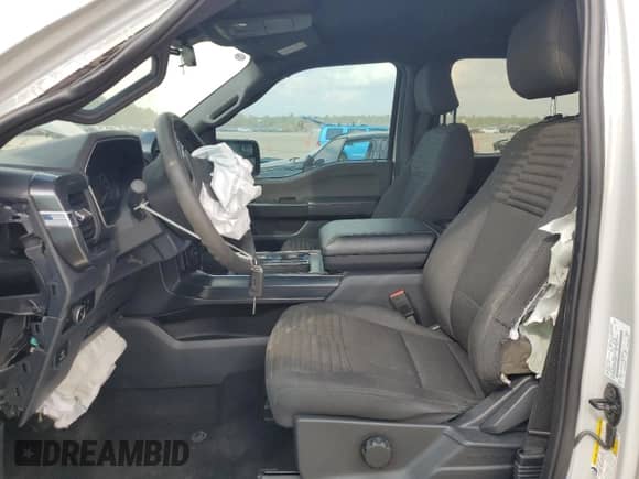 2023 Ford F-150 XL с VIN 1FTFW1E51PKG12659, выставлен на аукционе Copart как лот 89691685 с пробегом 21 867 миль миль и Списание • Salvage title. История ставок и продаж доступна на DreamBid. Изображение 7.