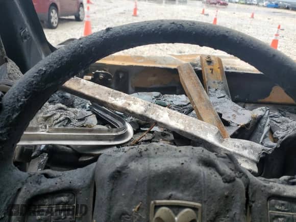 2018 Ram 1500 Tradesman z VIN 1C6RR7KM1JS262533, wystawiony jako Copart lot #55761535 z przebiegiem Nie podano mil oraz Nie do naprawy • Non repairable. Historia ofert i sprzedaży dostępna na DreamBid. Obrazek 9.