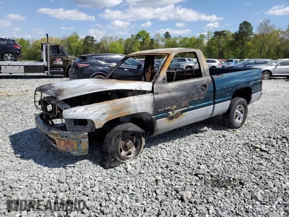 1999 Dodge 1500 с VIN 1B7HC16XXXS191008, выставлен на аукционе Copart как лот 53359485 с пробегом Не указан миль и Списание • Salvage title. История ставок и продаж доступна на DreamBid. Изображение 1.