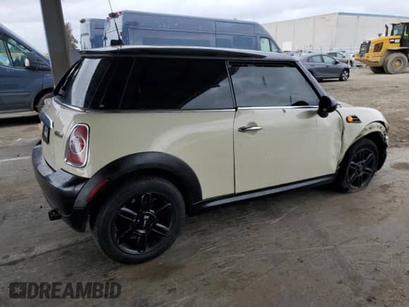 2013 MINI Hardtop with VIN WMWSU3C51DT691076, listed as a Copart auction lot 48066455 with 143,002 mi miles and Salvage title. Bid and sale history available at DreamBid. Image 3.