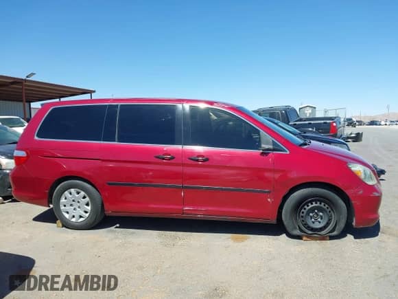 2006 Honda Odyssey LX with VIN 5FNRL38286B061810, listed as a IAAI auction lot 41802759 with 196,442 mi miles and . Bid and sale history available at DreamBid. Image 13.